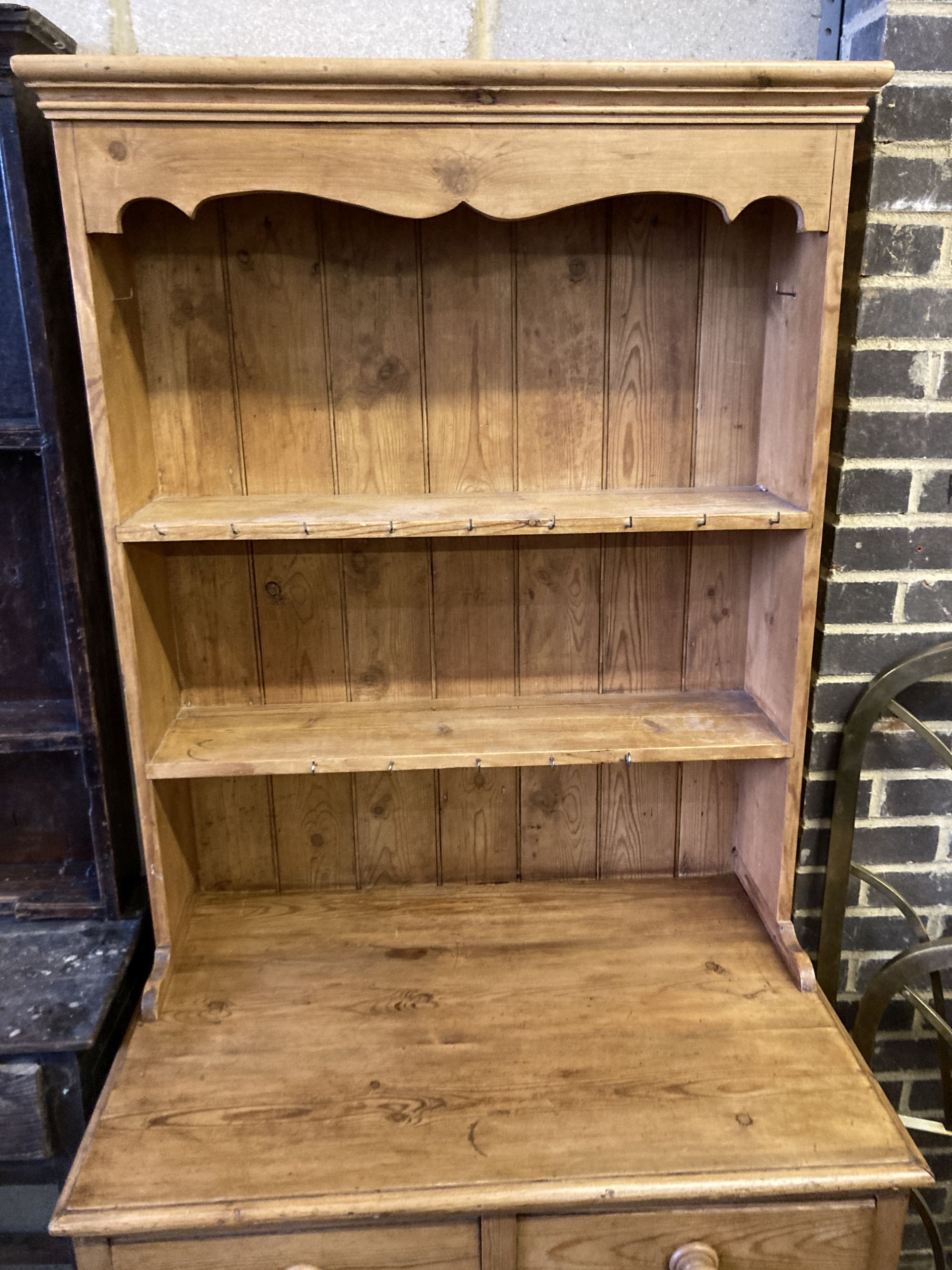 A small Victorian style pine dresser, length 92cm, depth 62cm, height 190cm